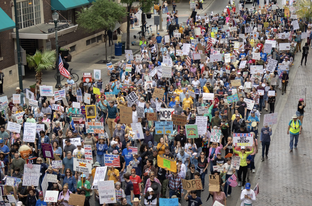 Aerial view of thousands of demonstrators with signs at the No Kings protest in downtown San Antonio